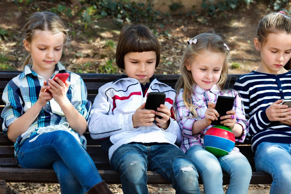 Want to give your child their first smartphone? Don’t consider their age – think about if they are truly ready for one before you do. Photo: Shutterstock