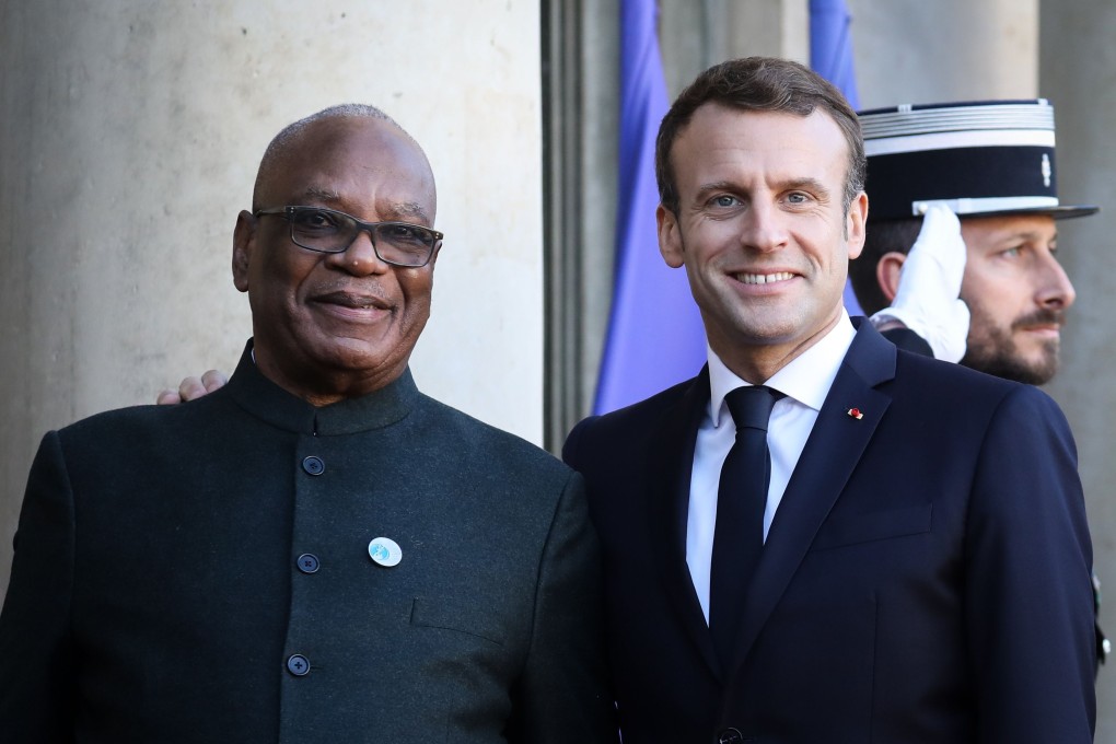 France's President Emmanuel Macron (R) welcoming Mali's President Ibrahim Boubacar Keita as he arrives at the Elysee presidential palace in November. Photo: AFP