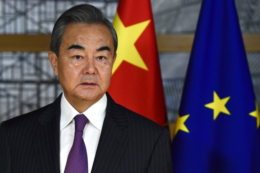 China's foreign minister Wang Yi waits for the arrival of European Council president Charles Michel prior to a meeting at the Europa building in Brussels on December 17. Photo: AP