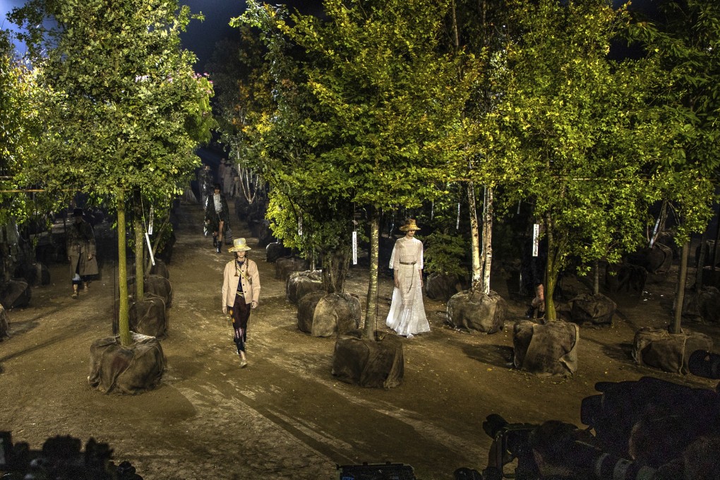 Models show looks from the Dior spring-summer 2020 collection beneath trees that were later replanted around Paris. The fashion industry has accepted the need to foster sustainability. Photo: Vianney Le Caer/Invision/AP