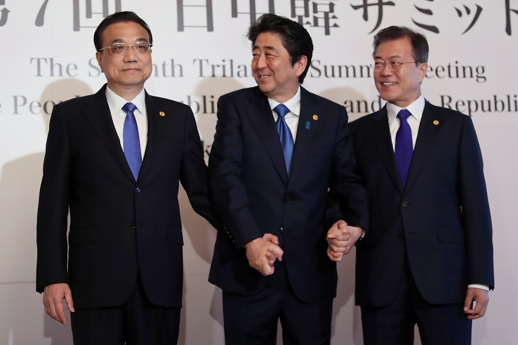 Chinese Premier Li Keqiang (left), Japanese Prime Minister Shinzo Abe (centre), and South Korean President Moon Jae-in are expected to meet in Chengdu on Tuesday for 2019’s trilateral talks. Photo: EPA-EFE
