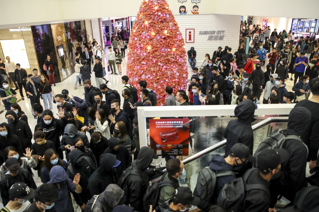 Violence flared at malls again during “Christmas shopping protests” but no matter what has gone before or how strongly people feel, they should at this time be thinking of others and striving to put aside their differences. Photo: Winson Wong