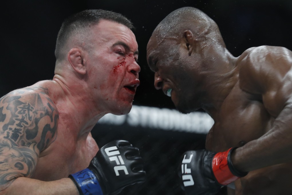 Colby Covington (left) battles with UFC welterweight champion Kamaru Usman at UFC 245. Photo: AFP