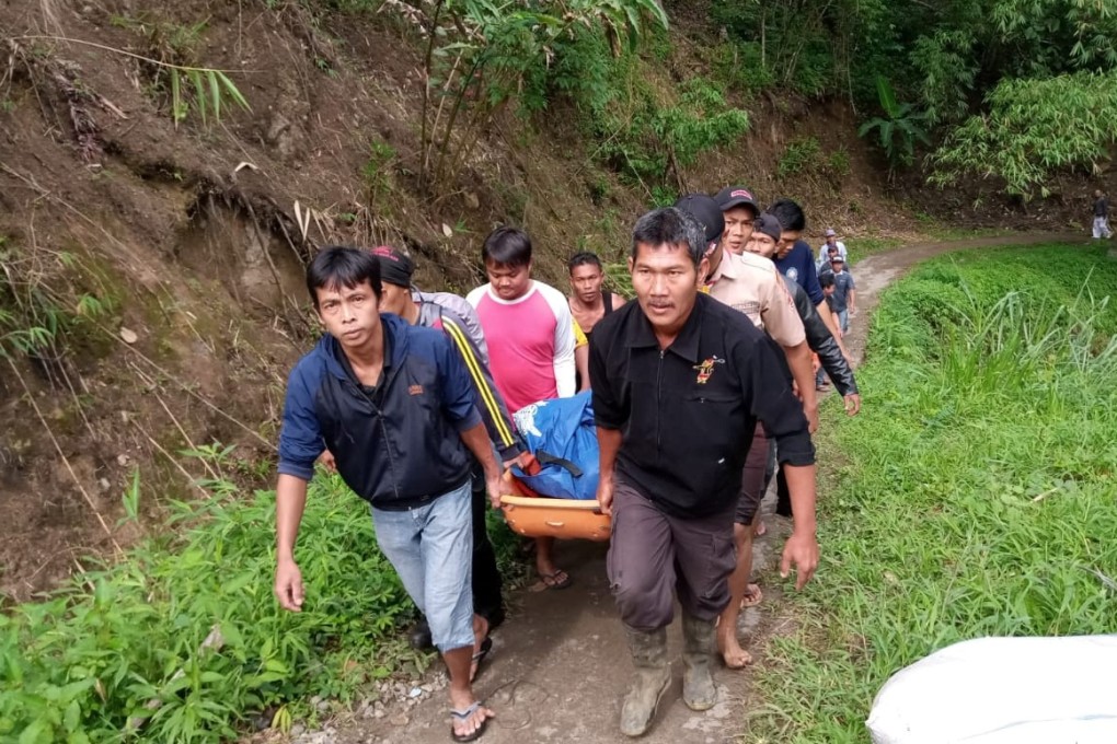 Rescue personnel retrieving a victim after a bus careered into a 150-metre deep ravine. Photo: Reuters