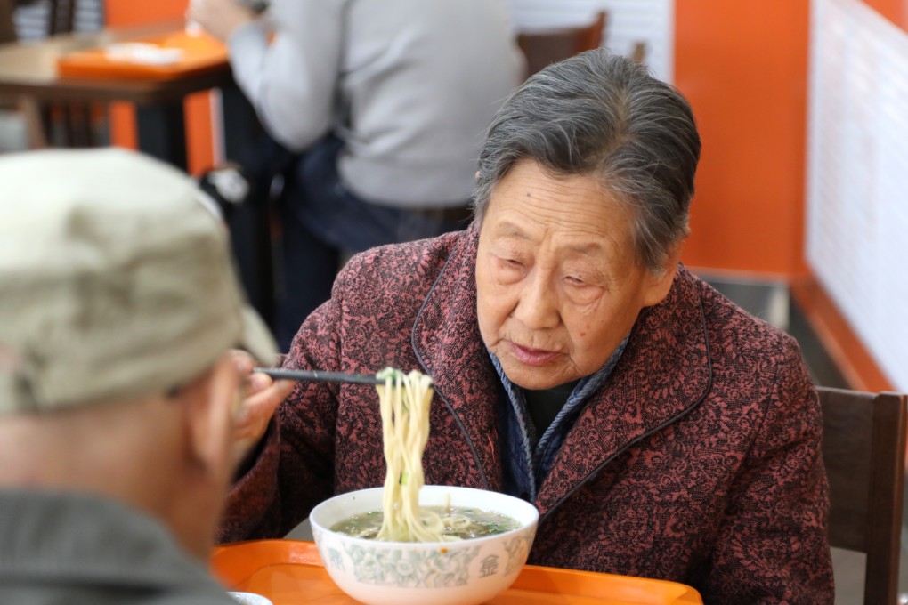 Customers eat noodles at a restaurant in Lanzhou, capital of northwest China's Gansu Province. The proportion of elderly internet users aged 50 and above has doubled to 13.6 per cent from 6.7 per cent four years ago. Photo: Xinhua