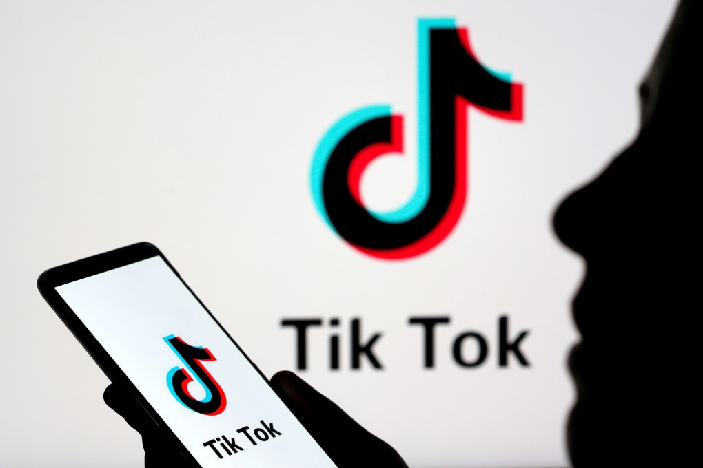 A person holds a smartphone with TikTok logo displayed in this picture illustration. Photo: Reuters