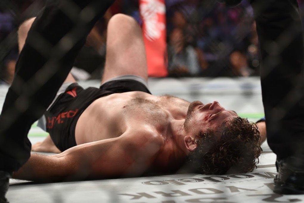 Ben Askren lies down on the canvas after tapping out to Demian Maia. Photo: SingaporeMaven