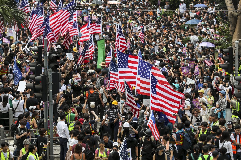 China’s Foreign Minister Wang Yi has used an end-of-year interview with state media to blast US interference in Hong Kong, where protesters have been waving American flags. Photo: Sam Tsang