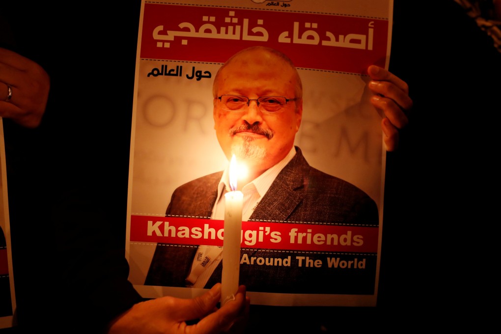 An activist holds a poster with a picture of journalist Jamal Khashoggi outside the Saudi Arabia consulate in Istanbul in October 2018. Photo: Reuters