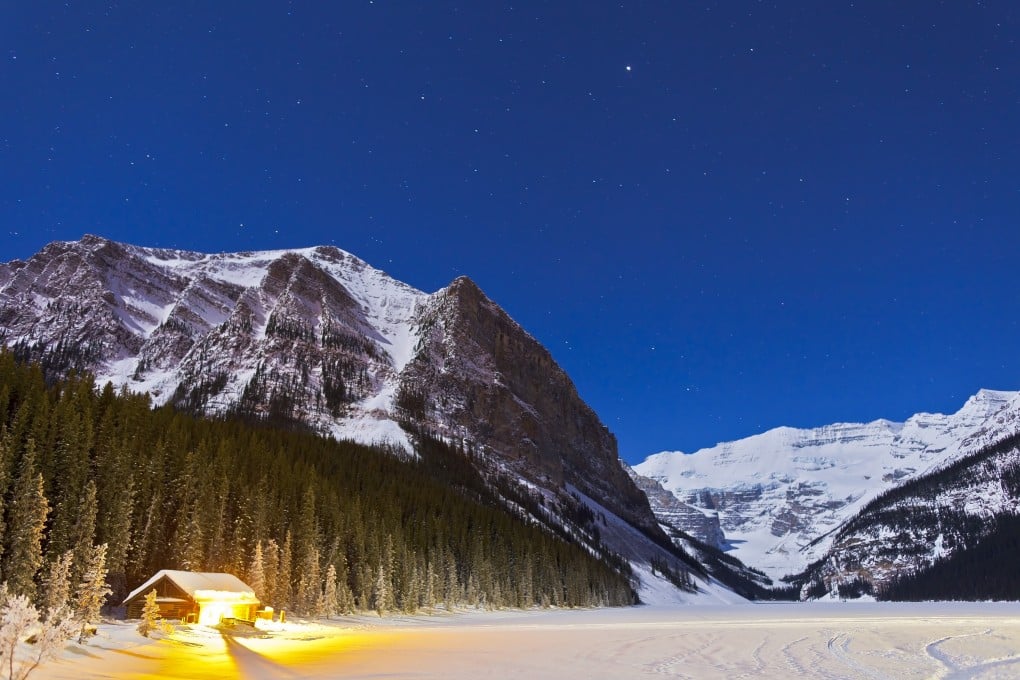 A cabin next to Lake Louise, in Banff National Park, Alberta, Canada. Photo: Getty Images