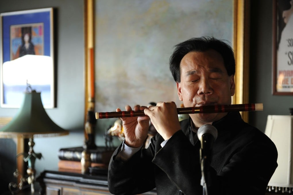 Da Chen once said he arrived in the United States with about US$30 and his bamboo flute. Photo: AFP