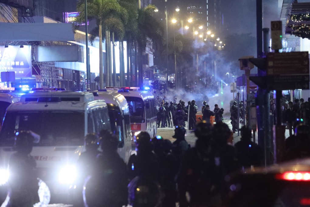 Police fire tear gas in Tsim Sha Tsui as Christmas Eve protests break out. Photo: May Tse