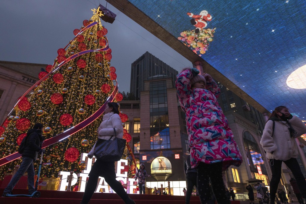 Shops in Beijing are decked out in festive decorations. Photo: AP