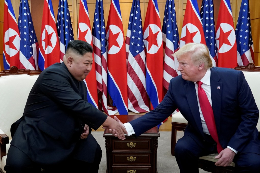 US President Donald Trump shakes hands with North Korean leader Kim Jong-un during a meeting in June 2019. Photo: Reuters
