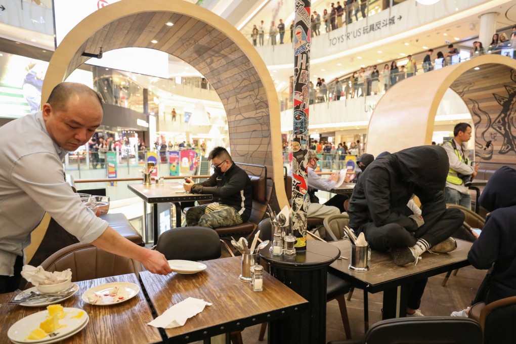 Hong Kong protesters in action at an eatery inside a shopping mall in Mong Kok on December 26. Photo: Nora Tam