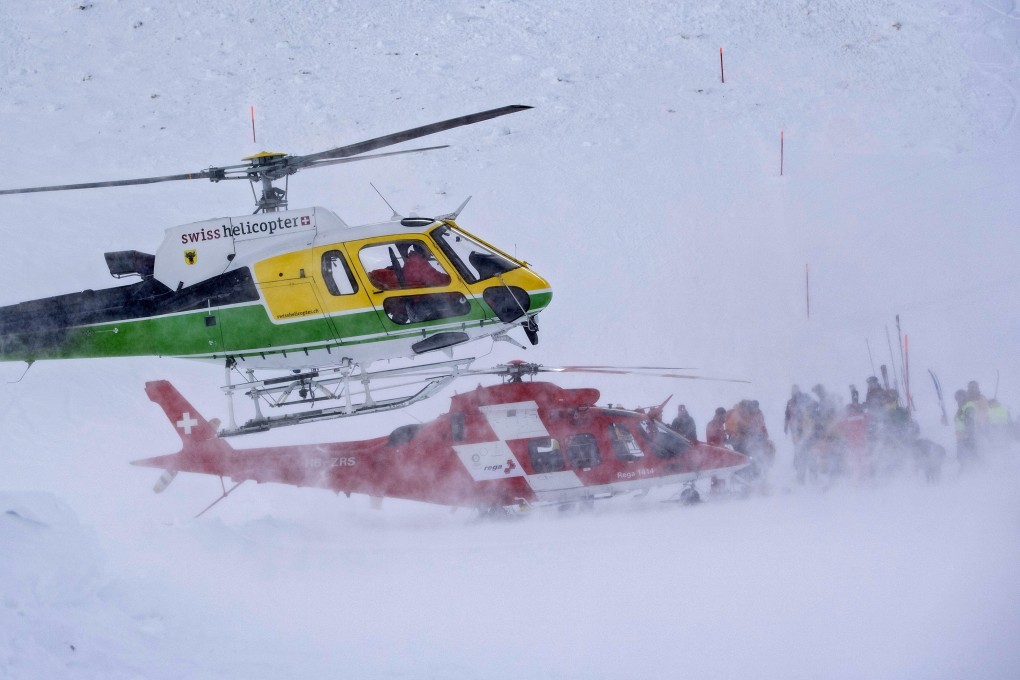 Rescuers search for missing persons after an avalanche swept down a ski piste in Andermatt, Switzerland, on Thursday. Photo: EPA-EFE