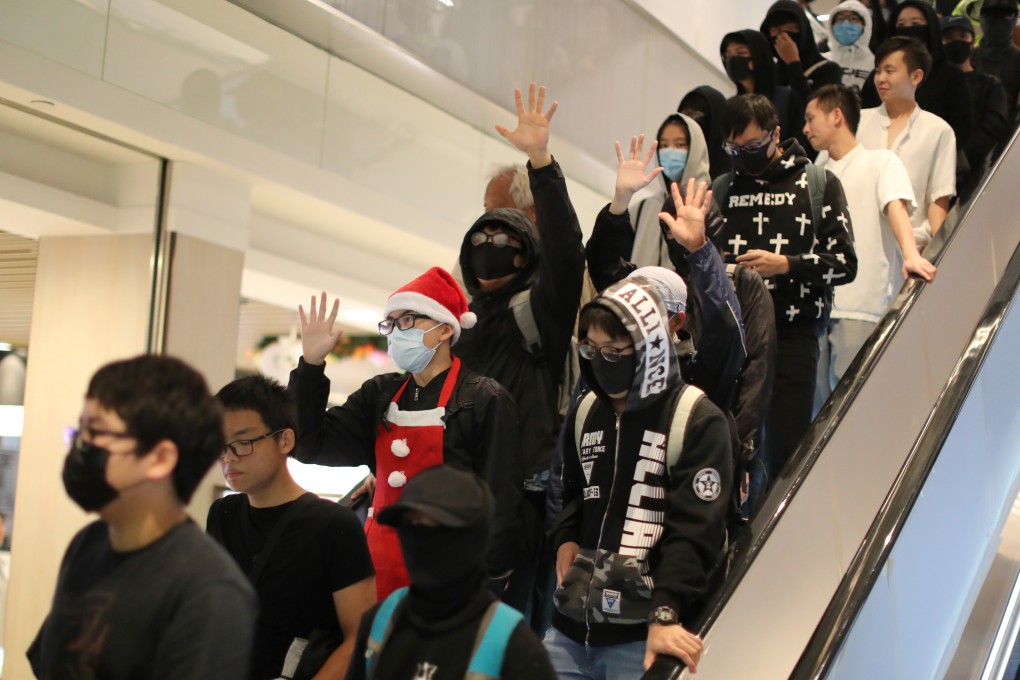 Protesters attend a Christmas Day rally in a shopping mall in Sha Tin on December 25. Photo: Reuters