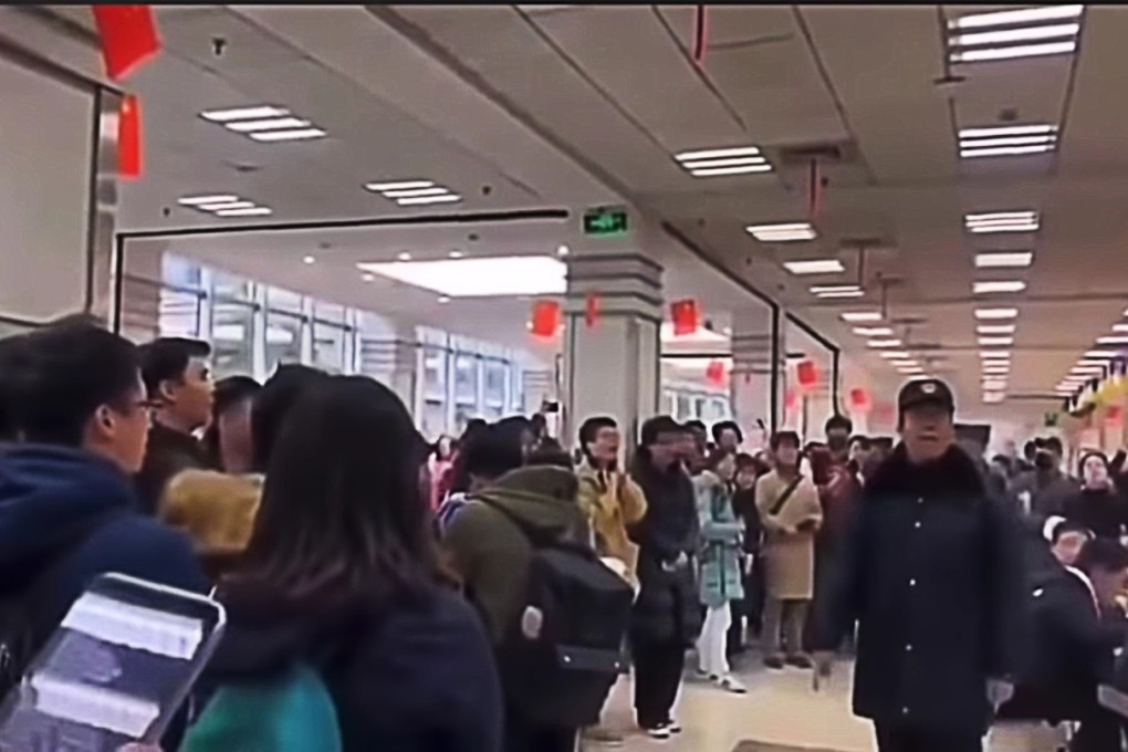 A screengrab of the censored video clip showing dozens of students taking part in a flash mob demonstration against changes to Fudan University’s charter. Photo: YouTube