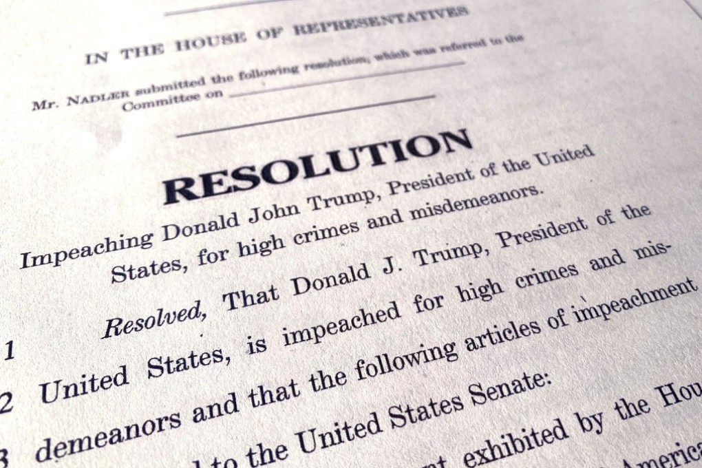 A copy of the House of Representatives articles of impeachment resolution that were used to impeach the US President Donald Trump. Photo: Reuters