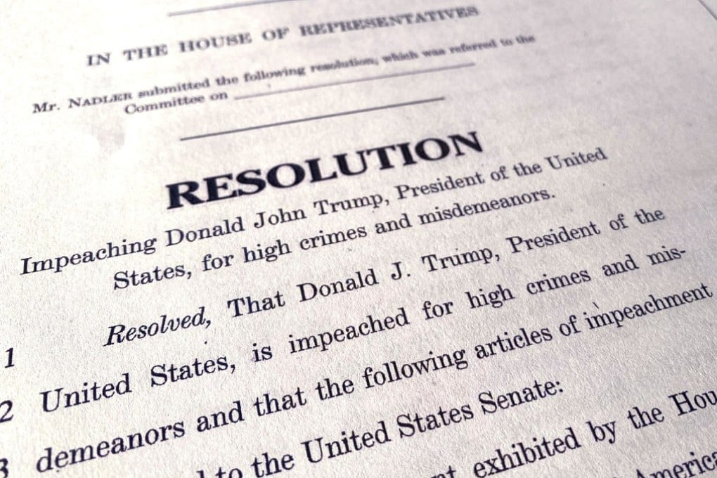A copy of the House of Representatives articles of impeachment resolution that were used to impeach the US President Donald Trump. Photo: Reuters