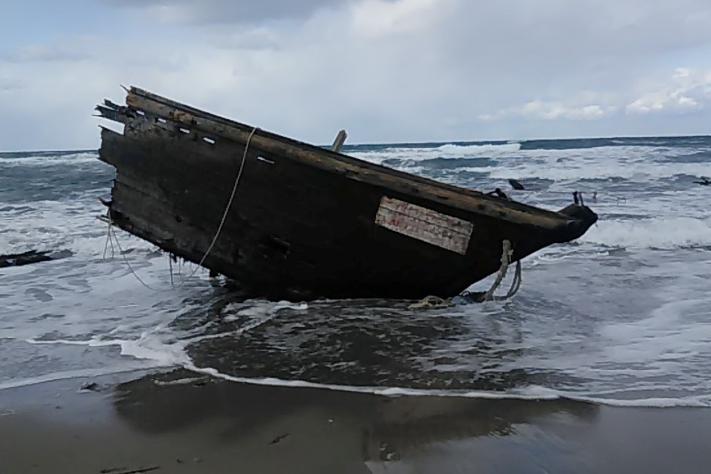 Part of a wooden boat containing human remains and suspected to be from North Korea. Photo: Reuters