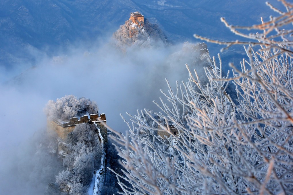 The pair got lost in the snowy mountains in the Huairou district of Beijing. Photo: Xinhua