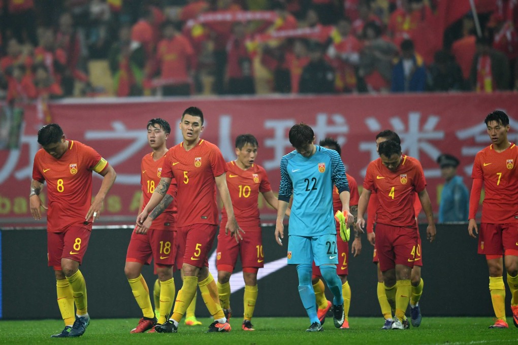 China’s players react after losing to Iceland in the 2017 China Cup. Photo: Xinhua