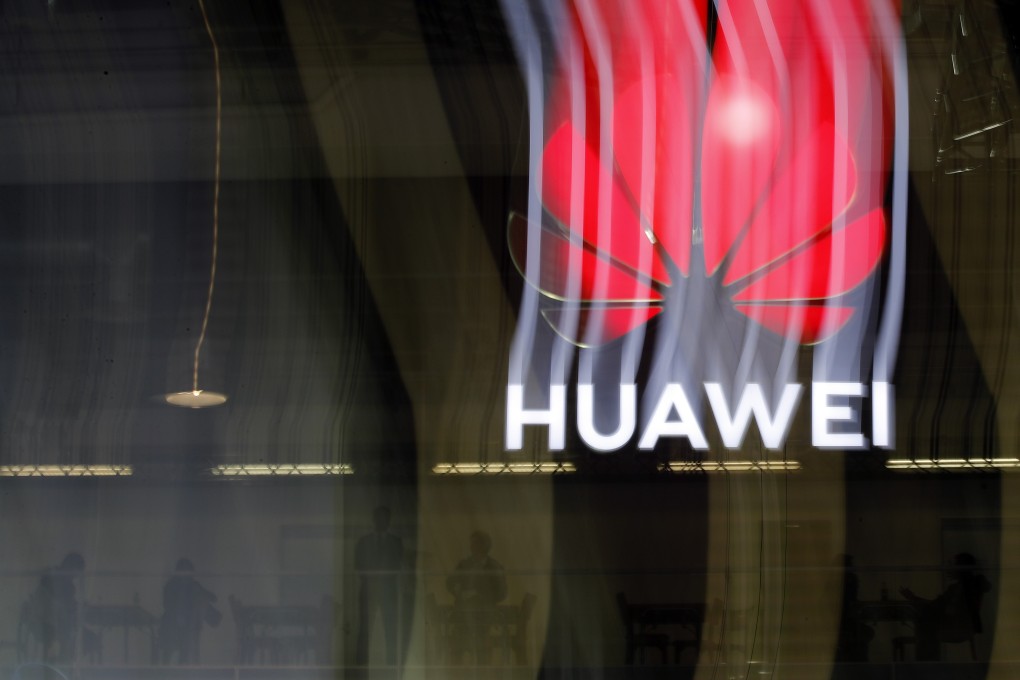 An illuminated Huawei sign is on display during the 10th Global mobile broadband forum in Zurich. Photo: AFP