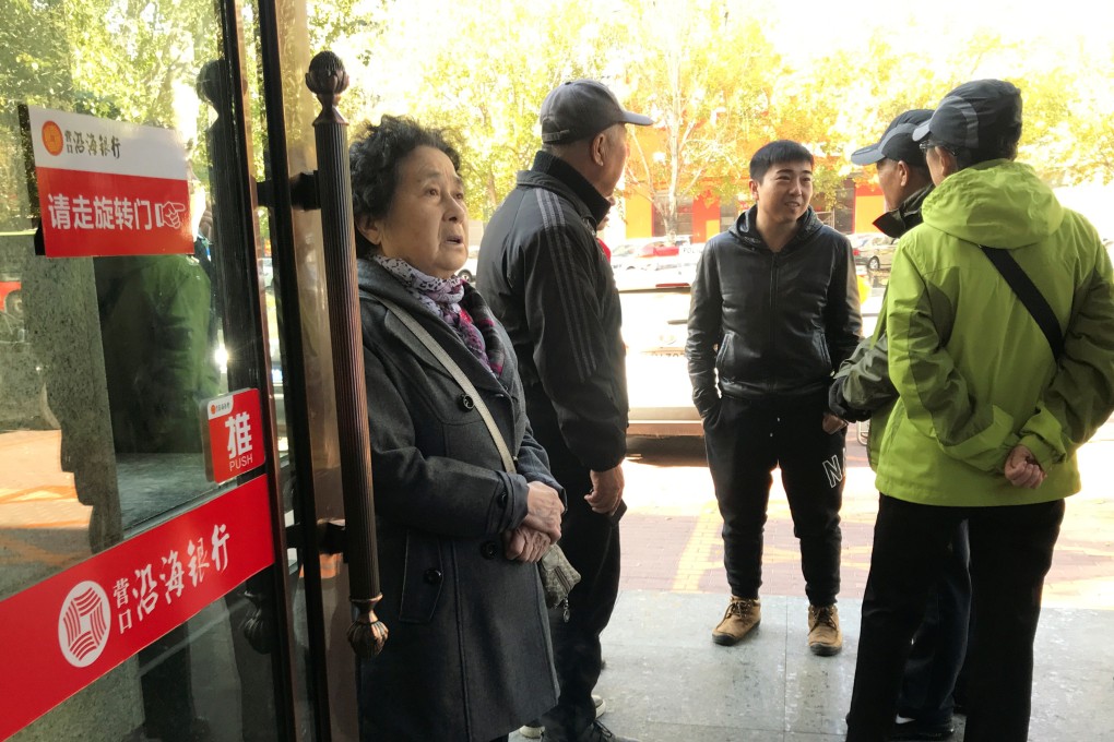 Yingkou Coastal Bank was one of two banks that suffered a run on deposits after rumours spread of a funding crunch. A spate of incidents have undermined confidence in banking institutions in China since the sudden nationalisation of Baoshang Bank last May. Photo: Reuters