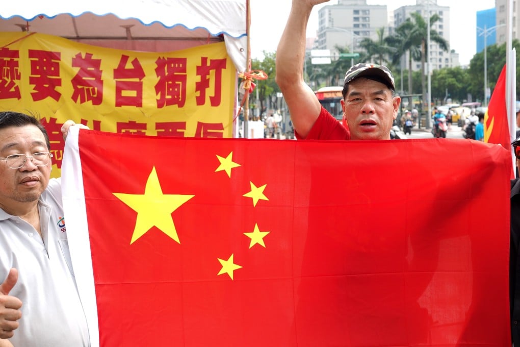 Pro-Beijing campaigners in Taipei, Taiwan’s capital, show China’s national flag. Photo: EPA-EFE