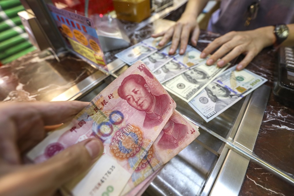 The US dollar is expected to remain the settlement currency for most of China’s trade. Photo: Roy Issa