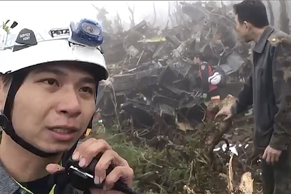 Emergency teams work at the crash site in the mountains of Wulai, New Taipei City on Thursday. Photo: Yilan Fire Bureau via AP