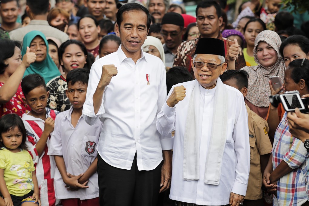 Indonesia's President Joko Widodo and Vice-President Ma'ruf Amin are seen after the announcement of the 2019 election results in Jakarta. Photo: EPA-EFE