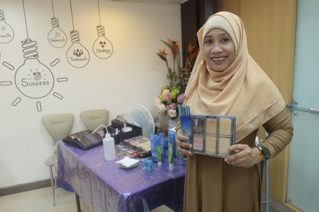 Factory worker and mother-of-four Julia Rasyada in Taipei, Taiwan. In her spare time she has been attending professional beauty classes organised especially for migrant workers. Photo: Antonia Timmerman
