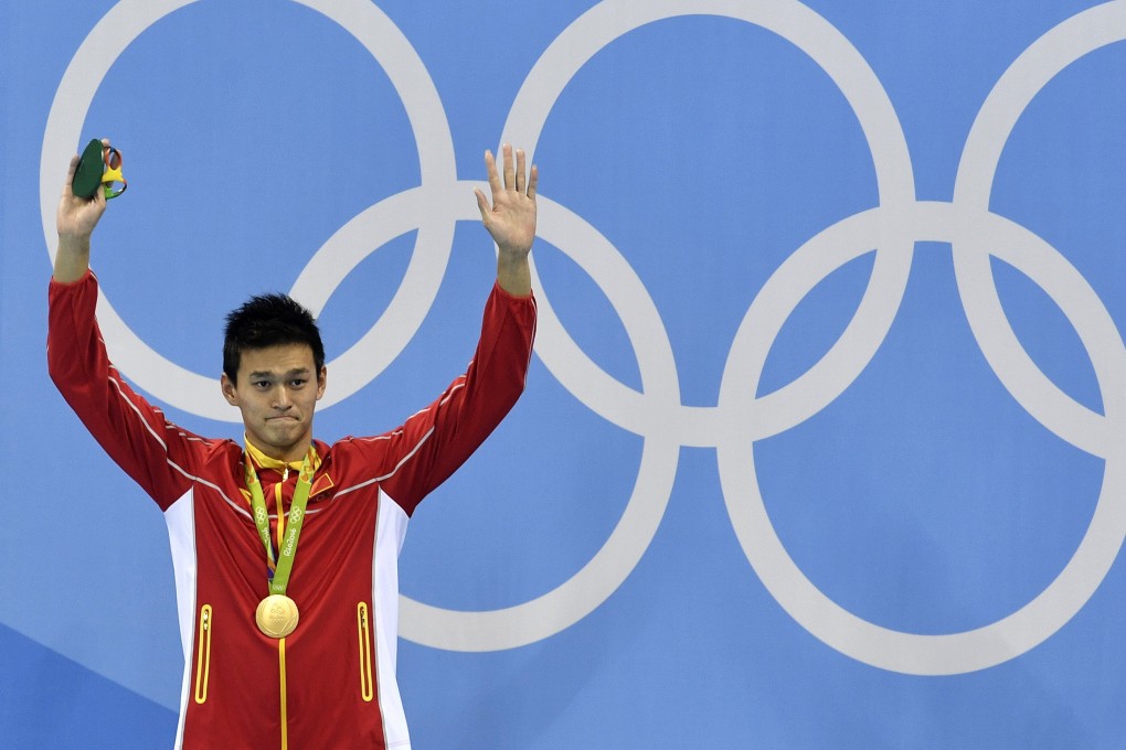 China’s Sun Yang celebrates with the gold medal in the men’s 200m freestyle at the 2016 Rio Olympics. Photo: AP