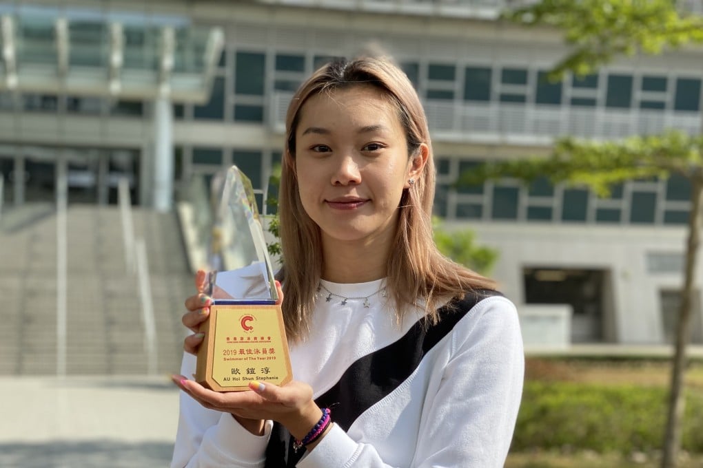 Stephanie Au displays her trophy at the Sports Institute. Photo: Chan Kin-wa