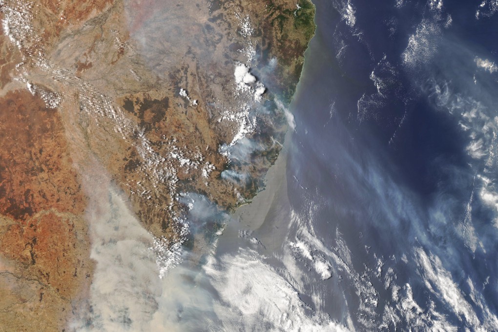 A satellite image showing thick smoke blanketing southeastern Australia. Photo: Nasa via EPA-EFE
