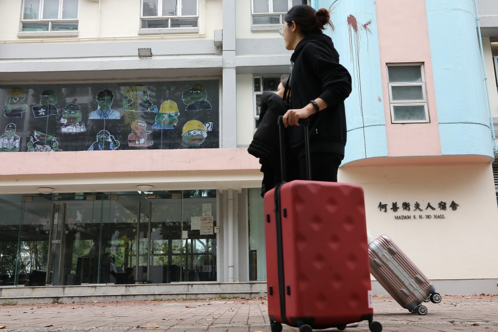 A student returns to the Chinese University campus in Sha Tin. Photo: K.Y. Cheng