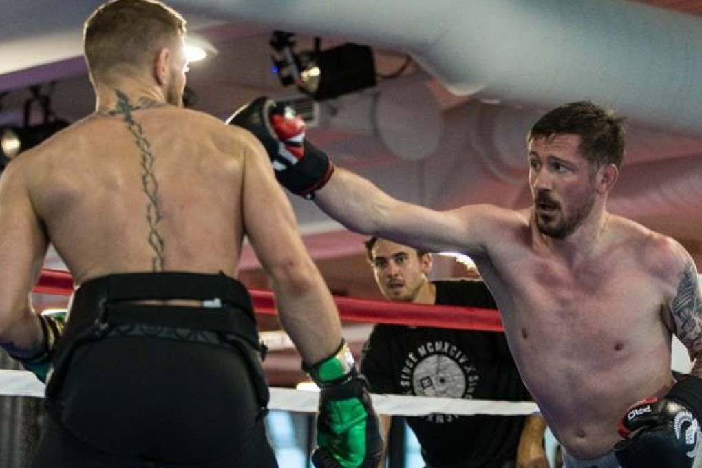 John Kavanagh (right) spars with Conor McGregor ahead of the bout against Donald Cerrone. Photo: Handout