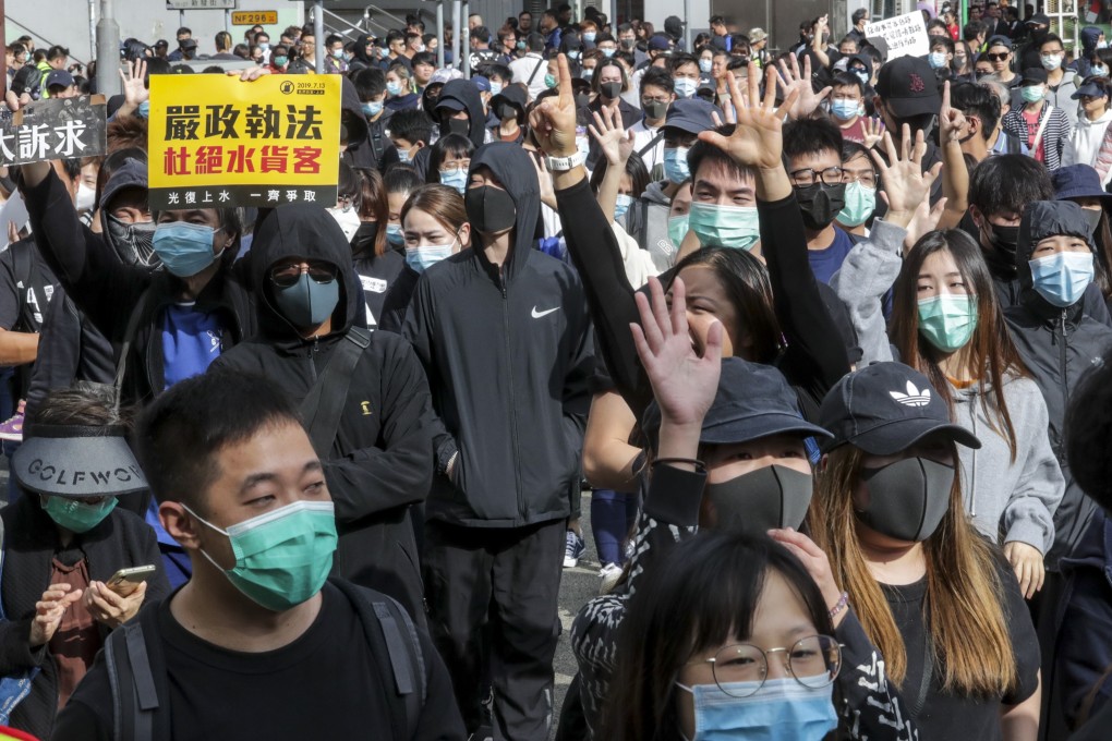 Thousands of people gathered in Sheung Shui on Sunday to protest against mainland Chinese shoppers and parallel traders. Photo: Edmond So