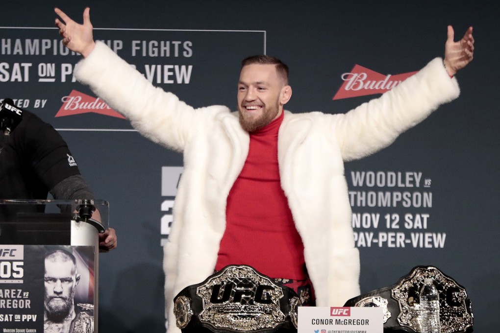 Conor McGregor arrives late at a pre-fight press conference in 2016. Photo: AP