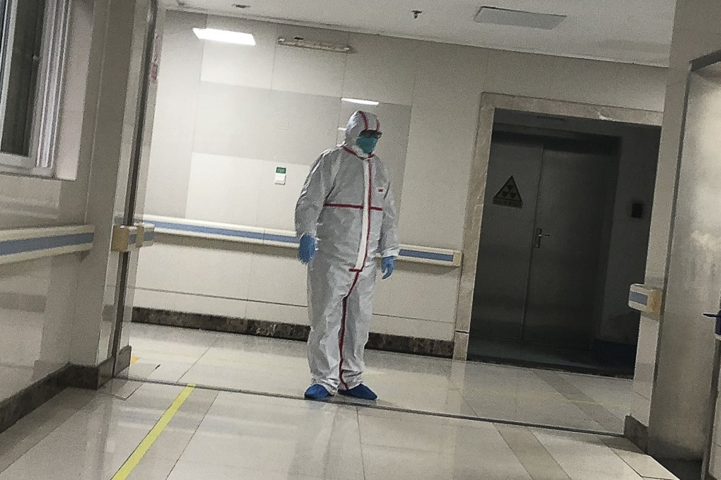 A doctor in full protective gear at the Wuhan Medical Treatment Centre. Photo: Simon Song