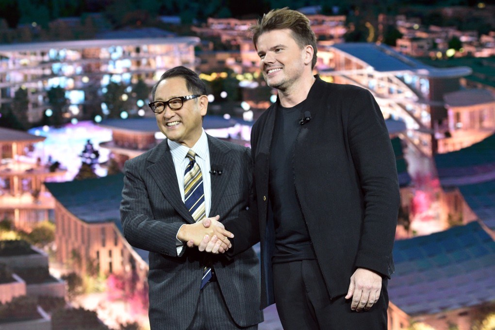 Toyota president and CEO Akio Toyoda (left) and Danish architect Bjarke Ingels speak about their smart city plan during a Toyota press event for CES 2020. Photo: AFP