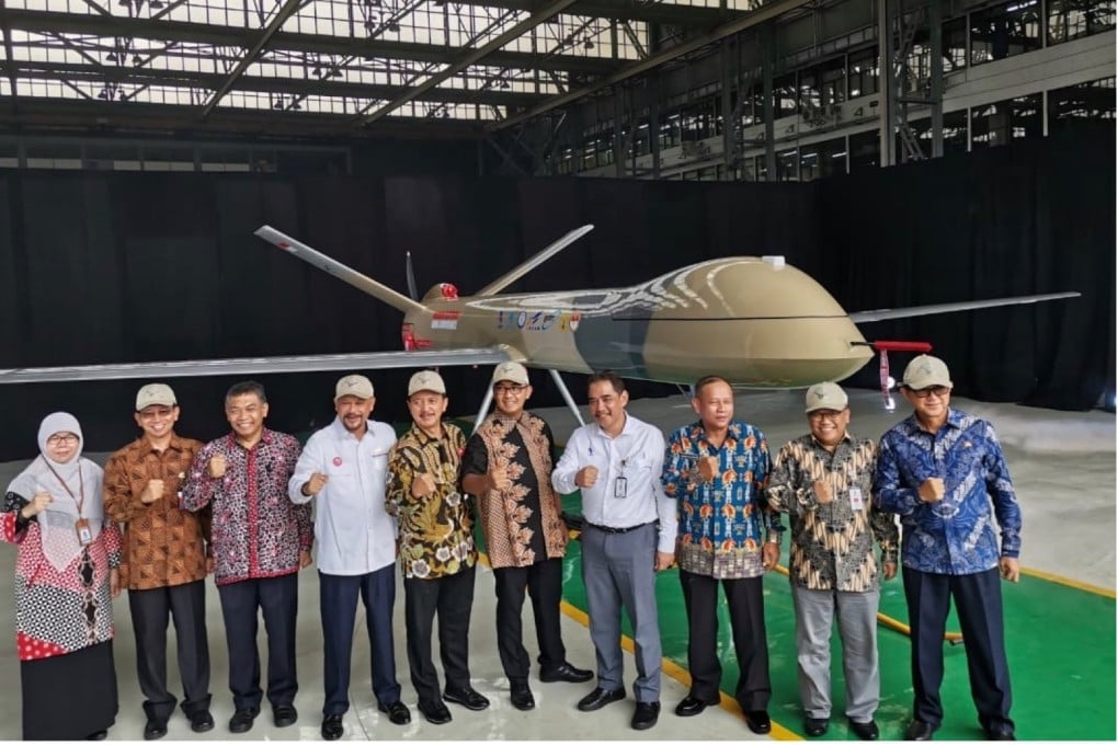 Officials attend weapons producer PT Dirgantara Indonesia's roll-out of a prototype of the MALE unmanned aerial vehicle, or UAV. Photo: Twitter