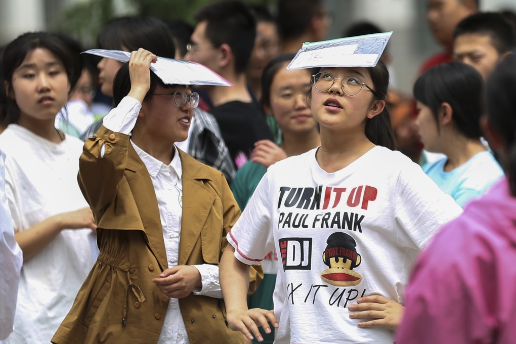 Candidates for gaokao, the all-important university entrance examinations, relax outside an examination venue in Pingliang city, Gansu province last June. China’s education system risks breeding overtrained test takers, rather than innovative thinkers. Photo: Xinhua