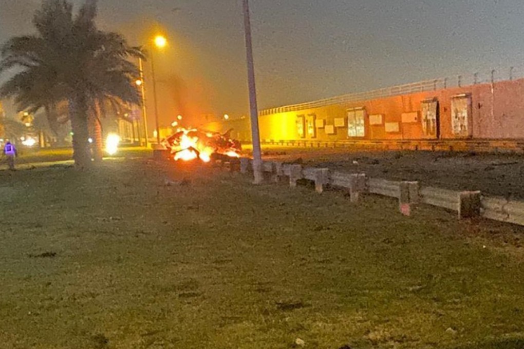 A burning vehicle at Baghdad International Airport after a US air strike. Photo: Iraqi Prime Minister Press Office via AP