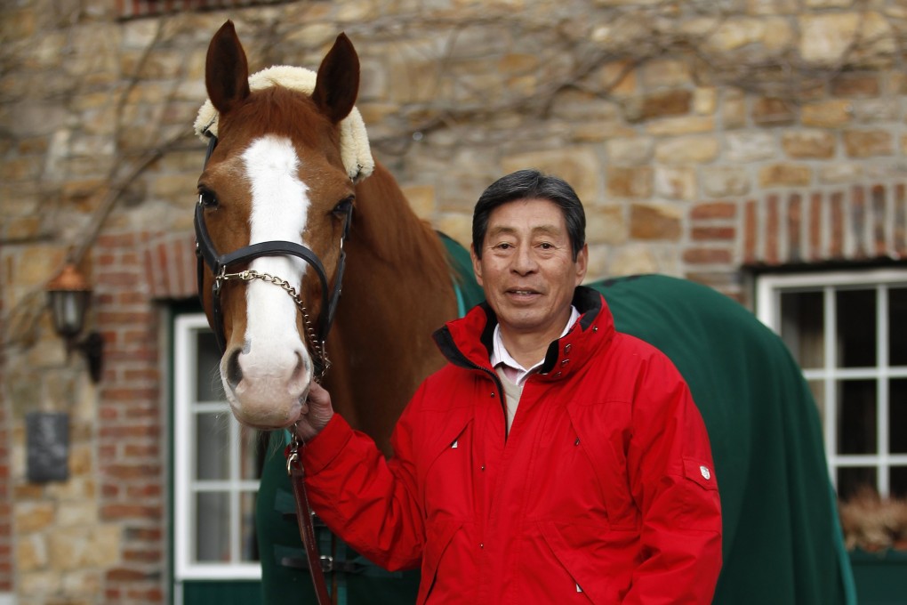 Japanese dressage rider Hiroshi Hoketsu poses with his horse Whisper after qualifying for the London 2012 Olympic Games where he became Japan’s oldest Olympian. Photo: Reuters
