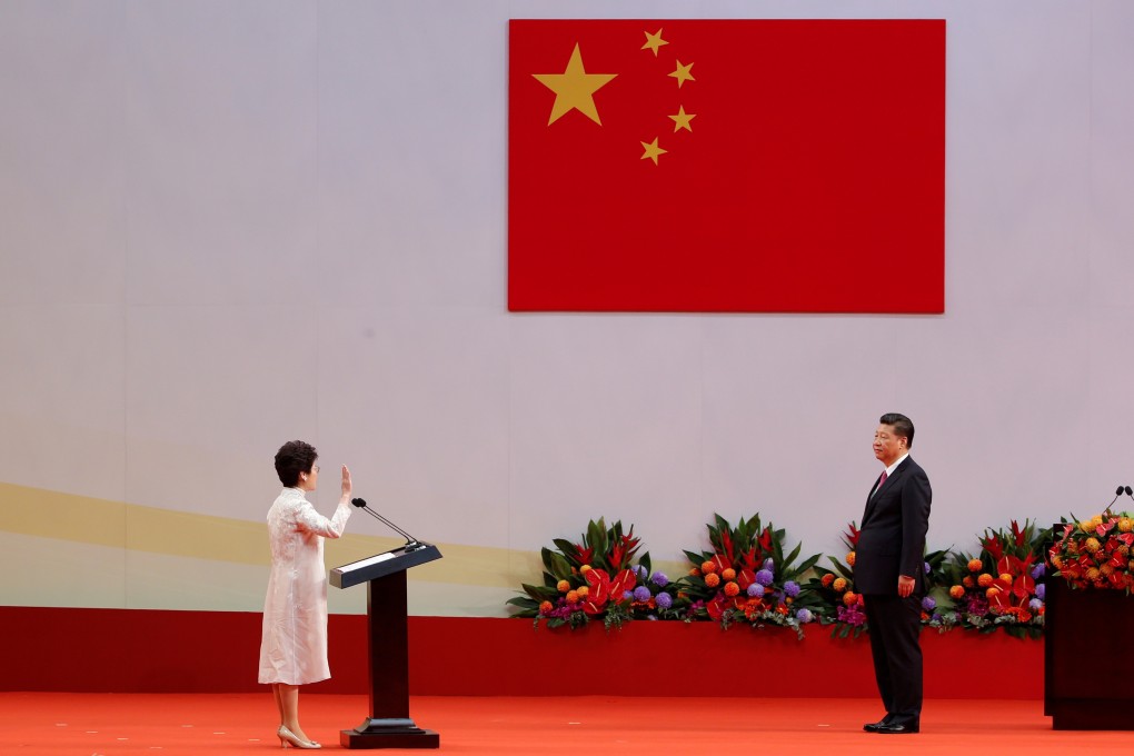 Carrie Lam takes her oath as Hong Kong chief executive before visiting President Xi Jinping, on the 20th anniversary of the city’s handover on July 1, 2017. Photo: Reuters