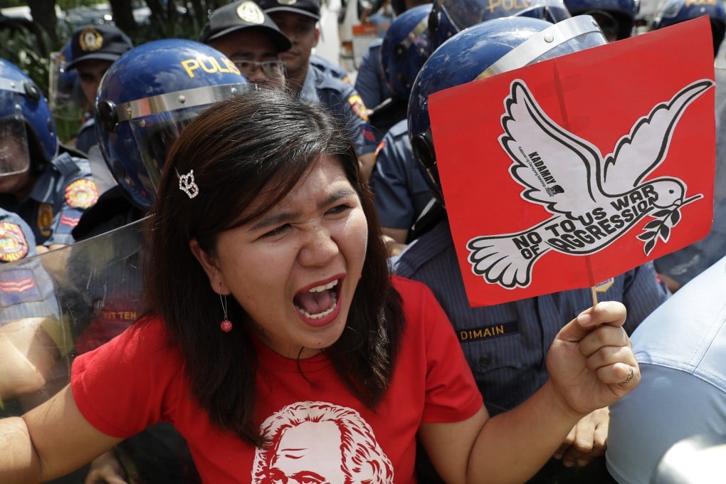 A protester in Manila at a rally on January 6, 2020, opposing the US attack that killed Iranian General Qassem Soleimani. Photo: AP
