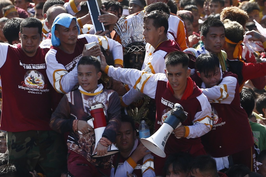 The Black Nazarene on a procession in Manila. Photo: EPA